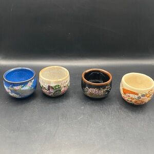 Set of 4 of Japanese Kutani ware sake cups, also known as "ochoko" or "guinomi".